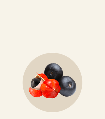 Oh La La ingredients featuring vibrant red and black fruits on a neutral background, showcasing natural beauty and freshness.